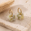 Boucles d'oreilles Fleur vert opale en acier inoxydable doré